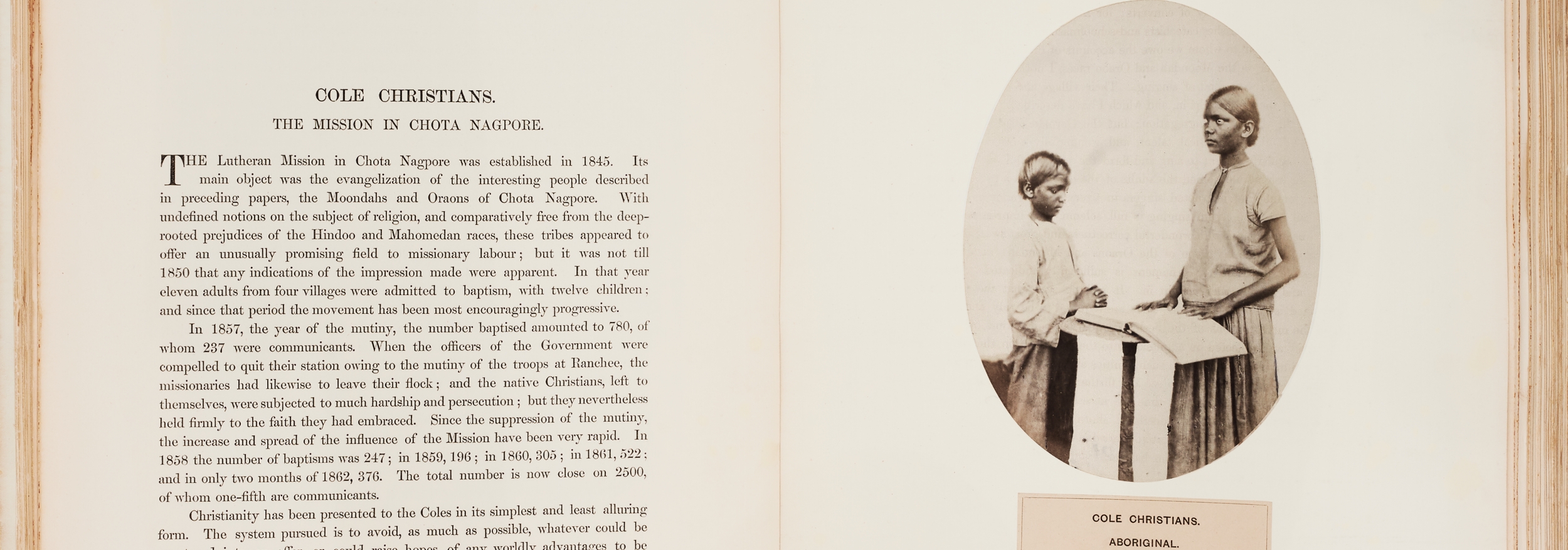 Two pages, with text on the left and a photograph on the right of two individuals and label: “Cole Christians. Aboriginal.”