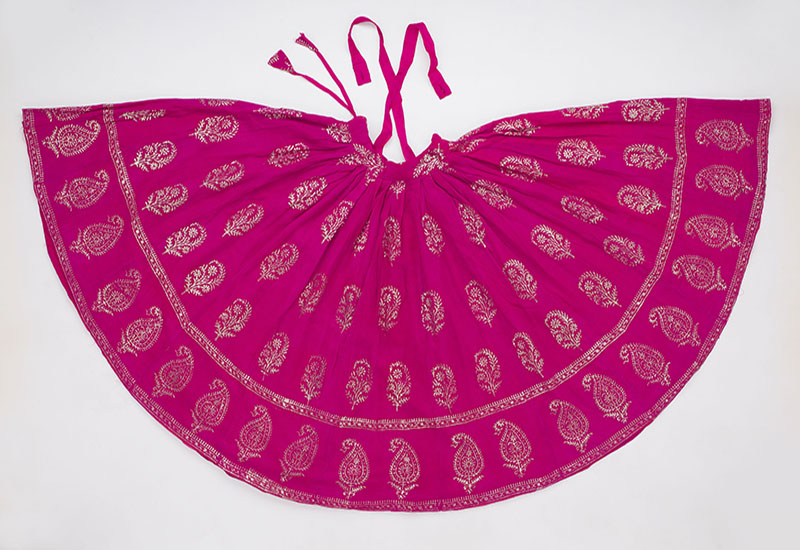 A Varak-printed skirt with a repeating paisley motif in the border and repeating floral motif in the main field.