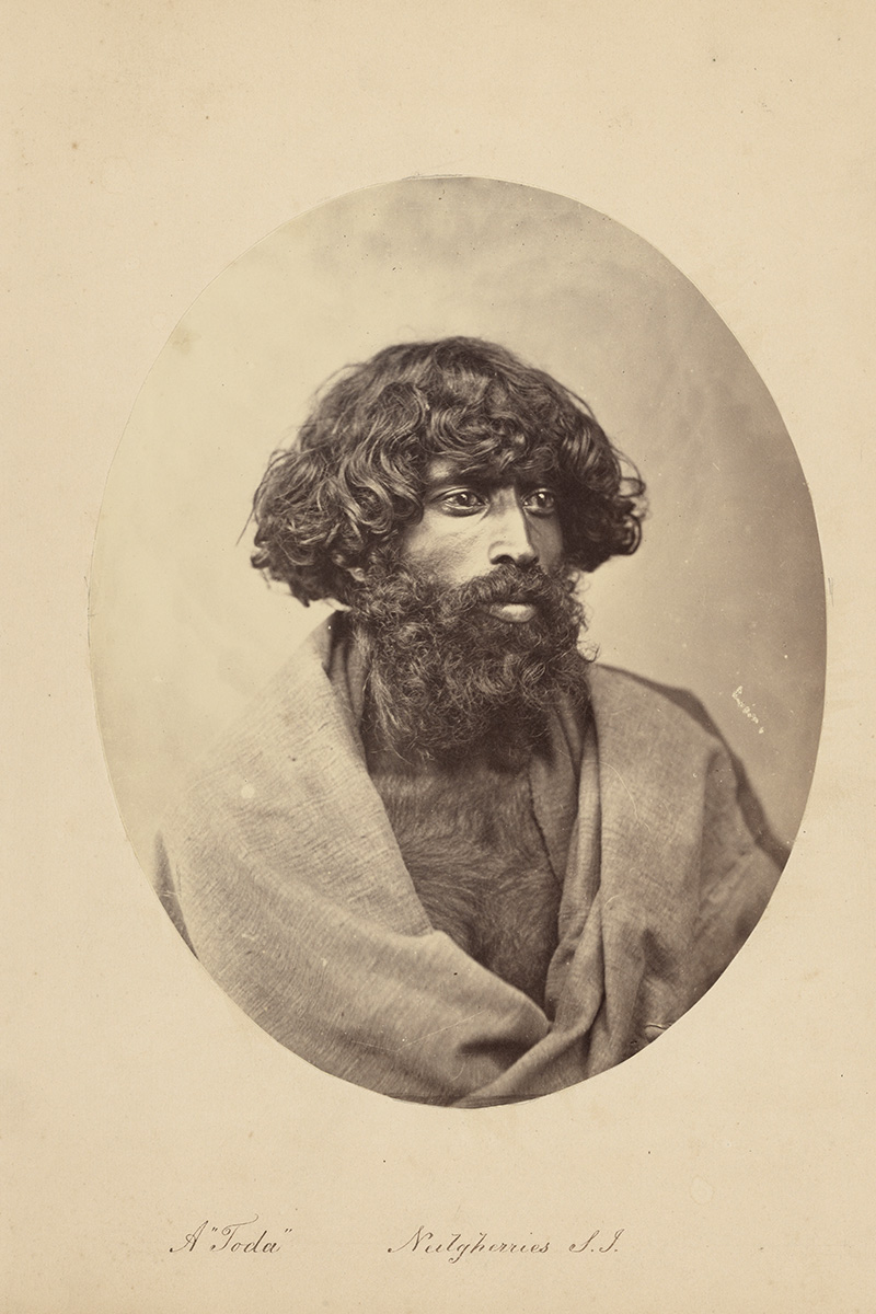 A sepia-toned photograph of a man from the Toda community.
