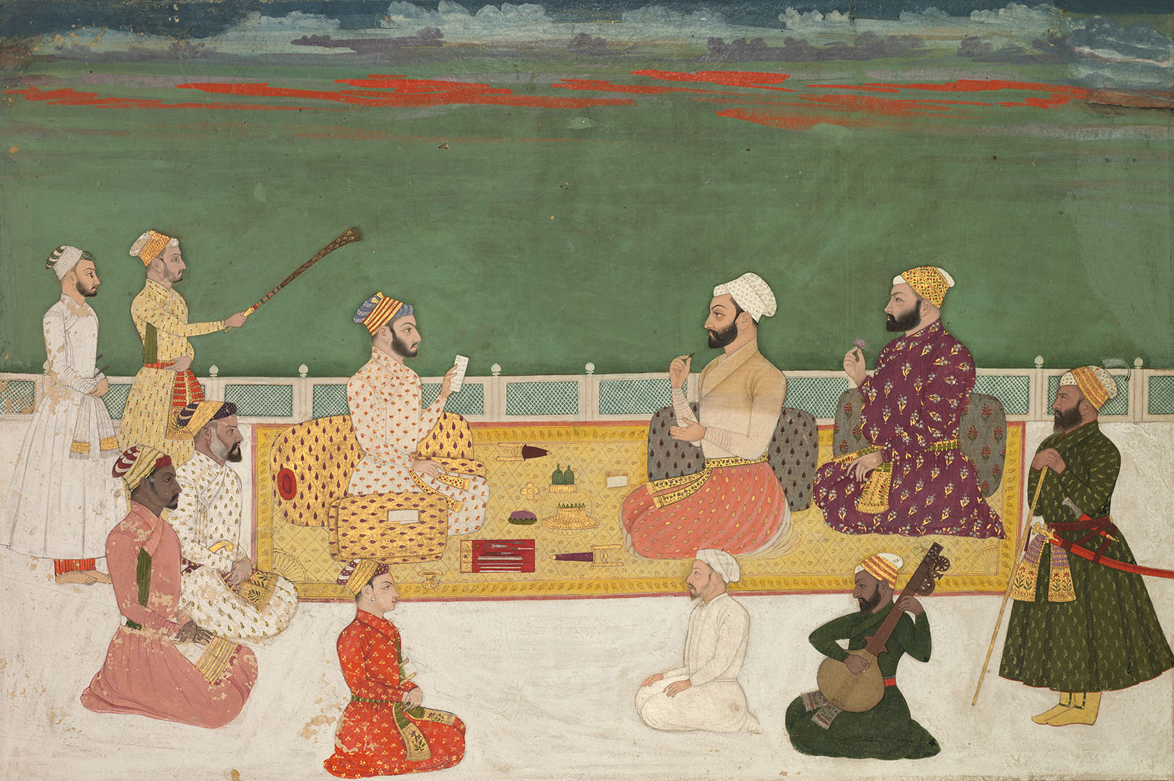 A painting depicting three noblemen seated on a carpet, accompanied by attendants and a musician.