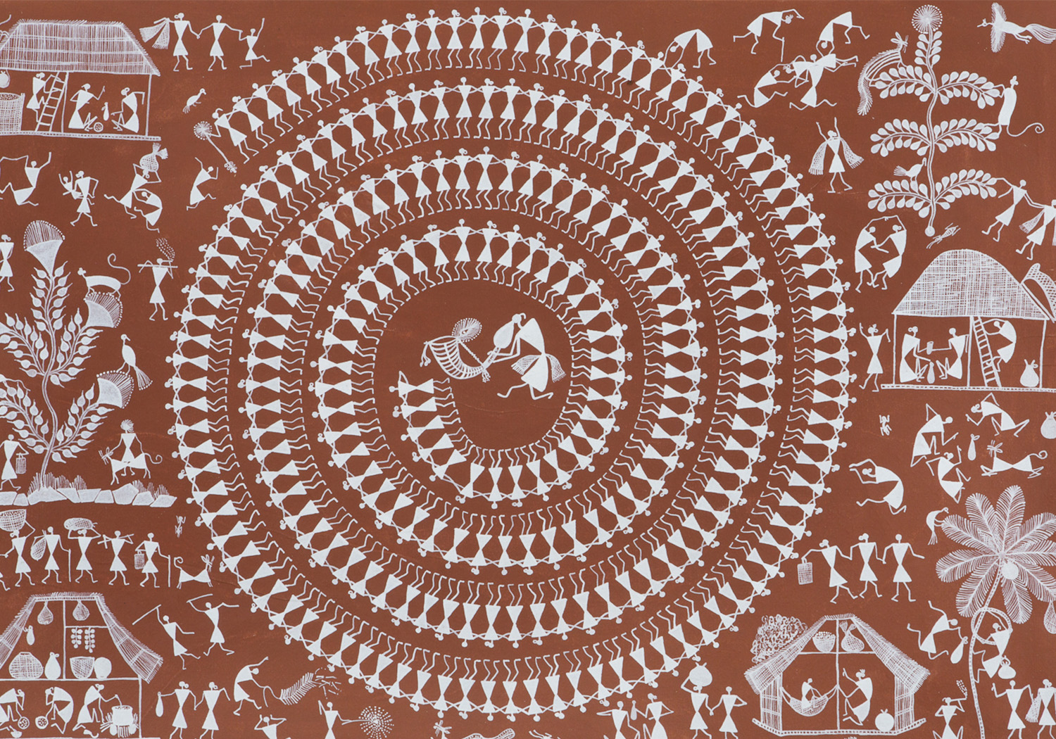A Warli painting depicting the celebrations on the festival of Diwali, with a spiral tarpa dance at its centre.