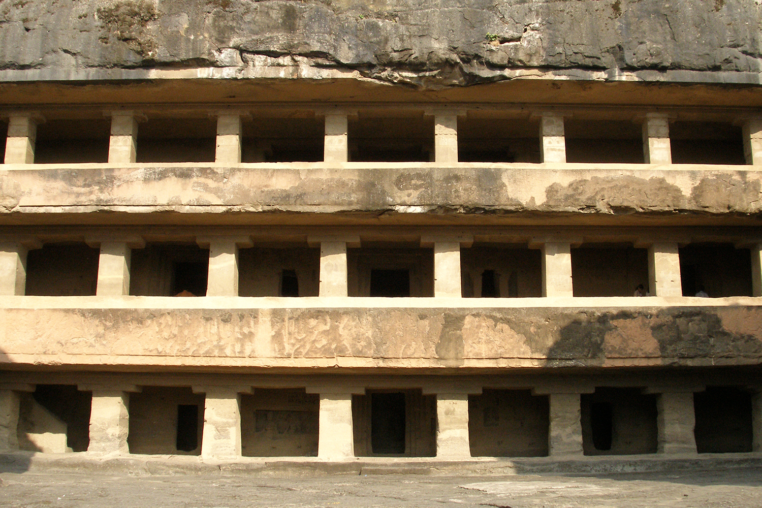 Photograph of the front facade of the triple storey Ellora Cave 11 known as Do Tal