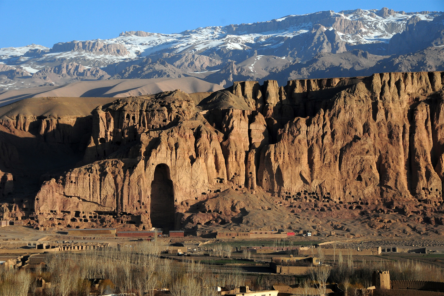 Photograph of the Bamiyan valley post-destruction of the Buddhas