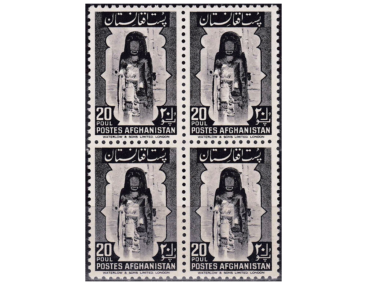 Photograph of four Afghan postage stamps featuring the Bamiyan Buddha