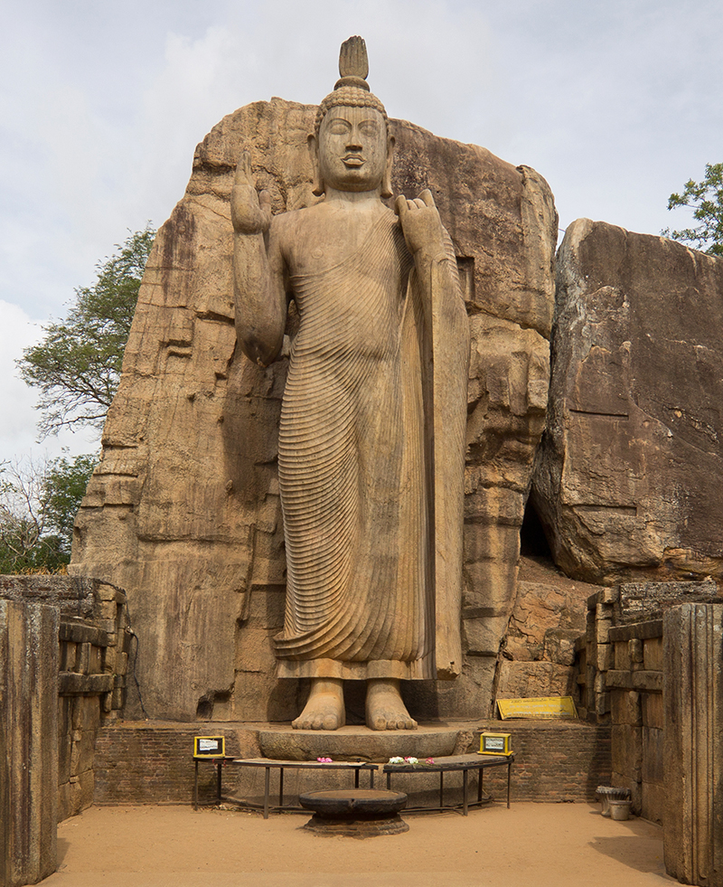 Photograph of the Avukana Buddha statue from the front