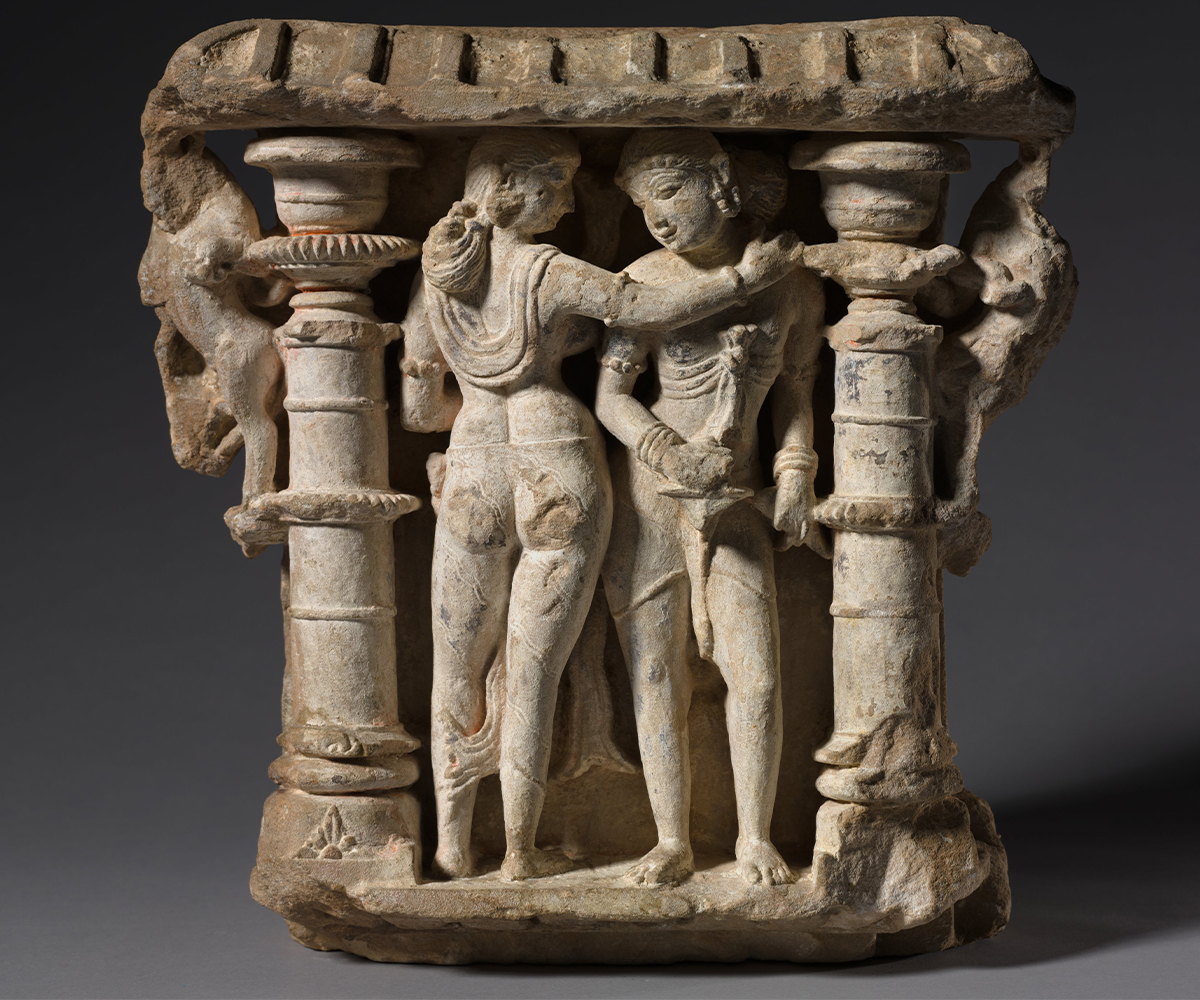 10th-century sandstone sculpture showing a couple or mithuna