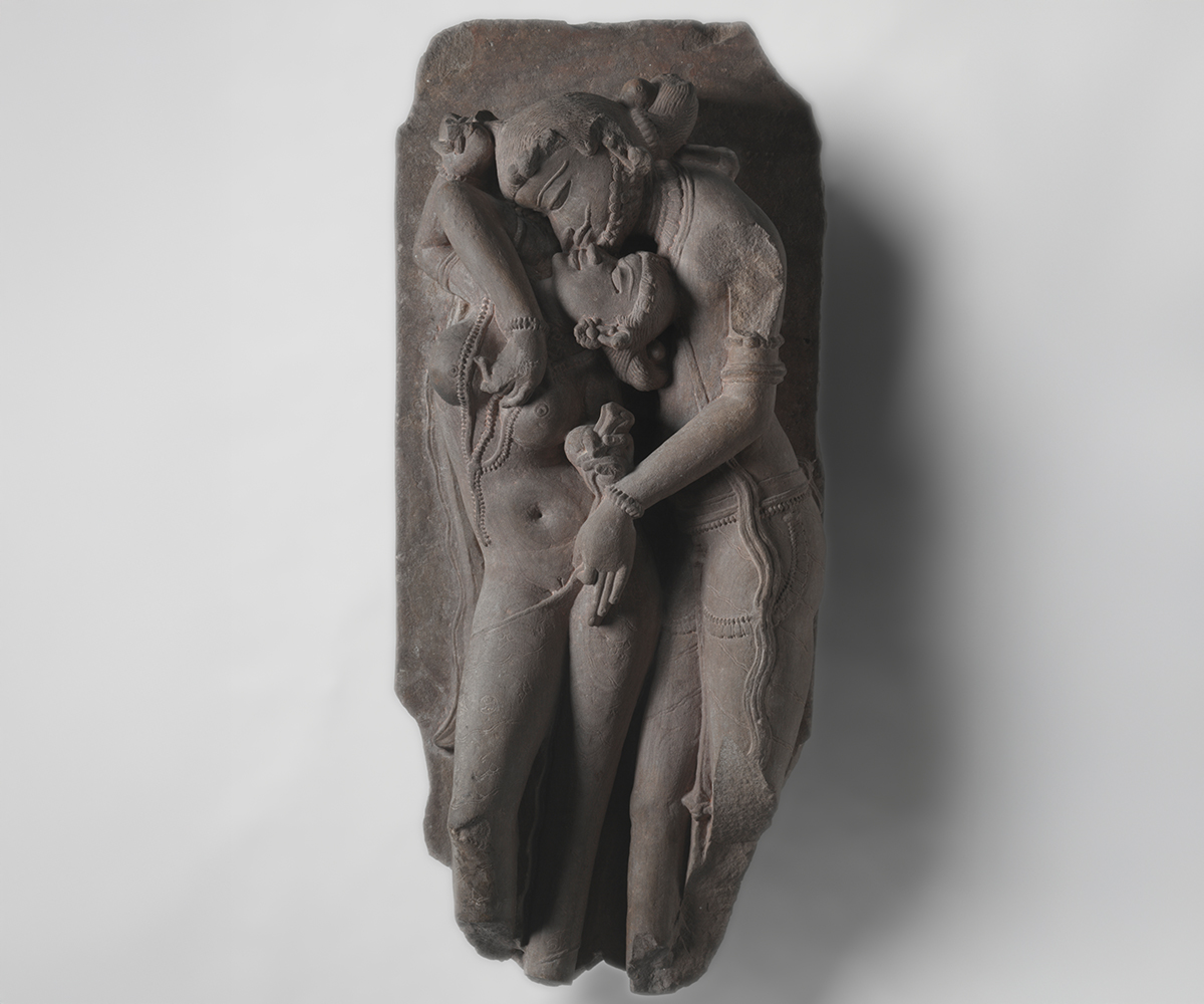 11th-century sandstone sculpture showing lovers embracing or mithuna